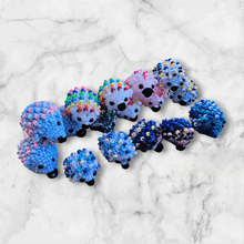 Load image into Gallery viewer, Hedgehog sensory crochet toy - Mariposa Rainbow Boutique
