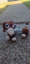Load image into Gallery viewer, Slinky handmade crochet rebel dog plush made with soft yarn
