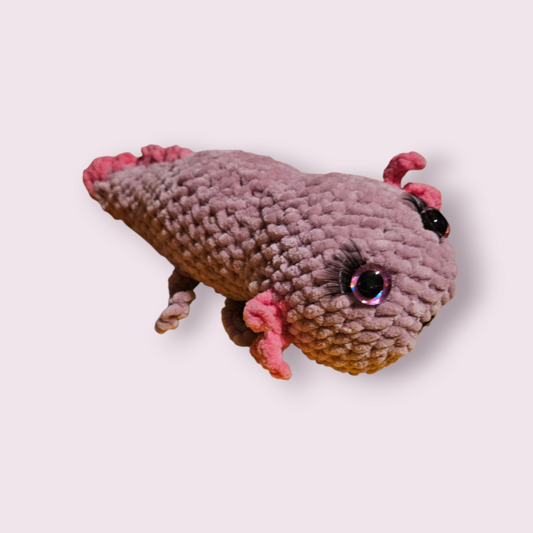 Small axolotl laying plush